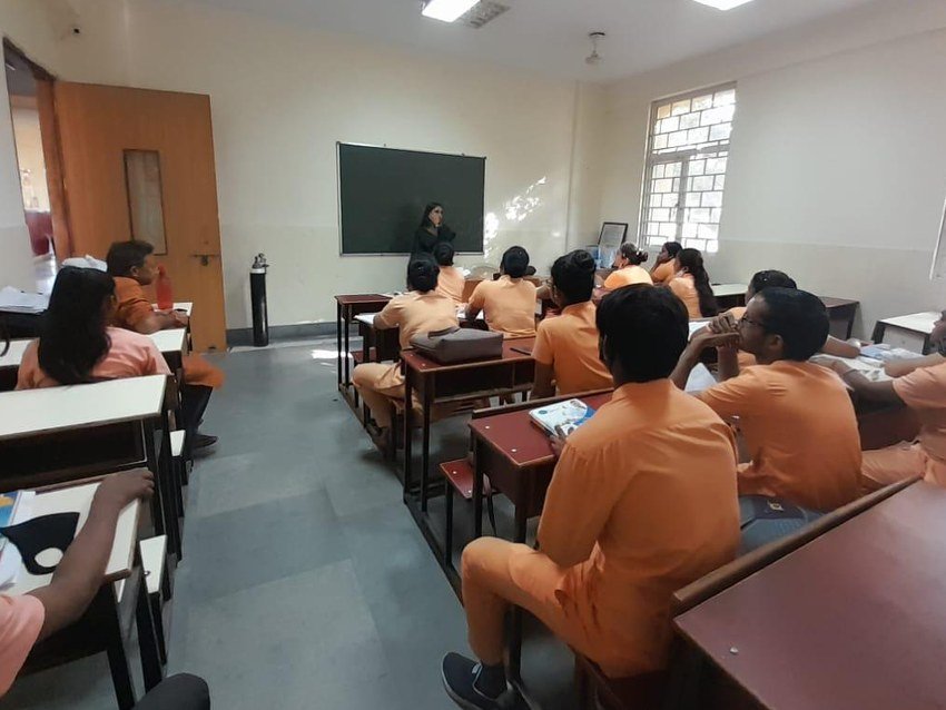 Students attending a nutrition education session in a college classroom